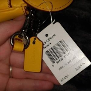 DISNEY X COACH YELLOW CLUTCH